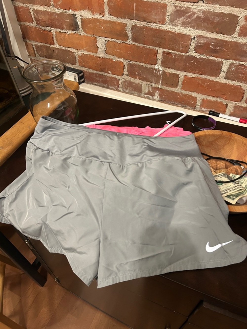 Nike Women’s Light Gray Athletic Shorts with White Swoosh